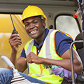 african-bulldozer-operator-talking-on-walkie-talkie-000026224547_Large-resized.jpg